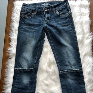 Revolt straight distressed denim. Woman’s size 7